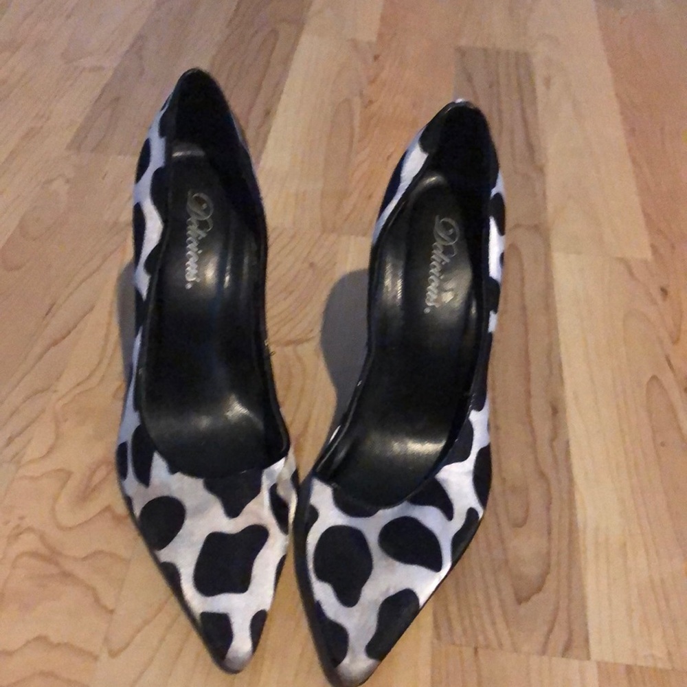 Delicious cow print 3 inch heels.